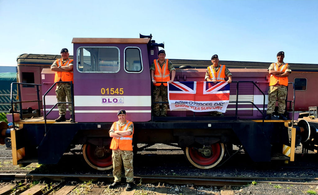 Members of 507 STRE with locomotive